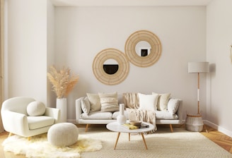 a living room filled with furniture and a mirror